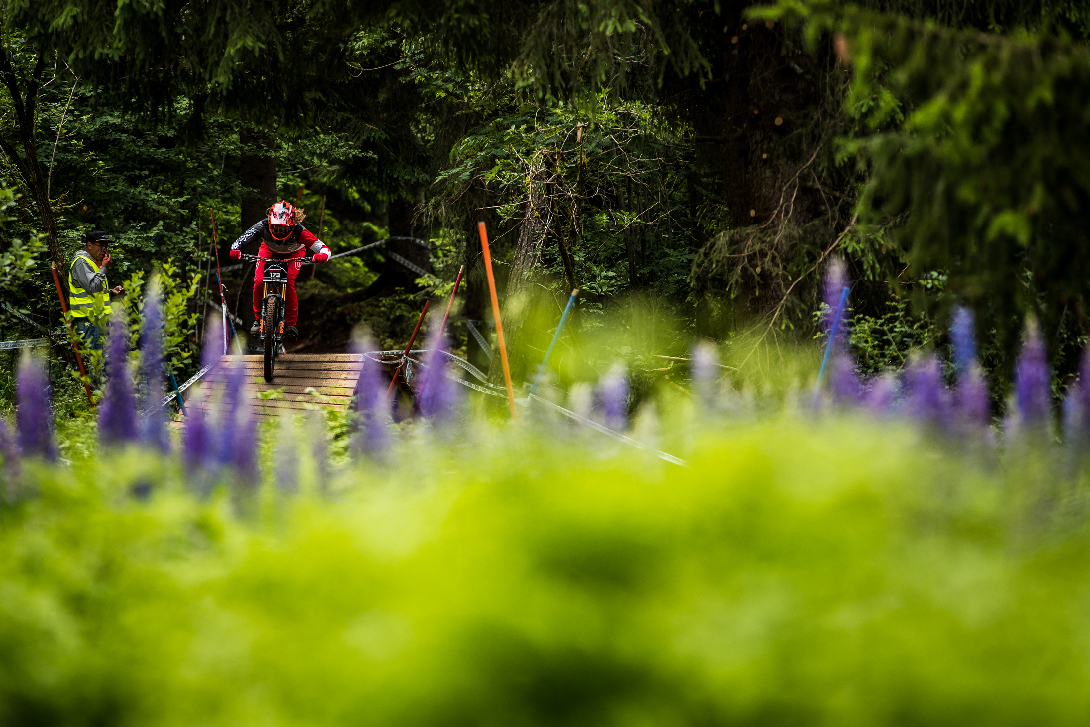 Vaea Verbeeck pops out of the woods on the DH course. Crankworx Innsbruck 2019.